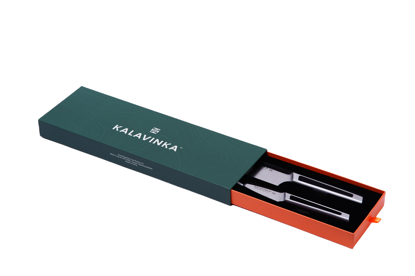 A green rectangular KALAVINKA branded box with an orange interior holds the VENDANA Series 2-Piece Essentials Knife Set, featuring an 8-Inch Chef's Knife and a 3.5-Inch Paring Knife with ergonomic handles, partially visible in the open drawer.